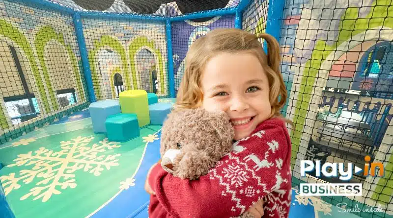 petite fille se trouvant dans une aire de jeux royaume des neiges